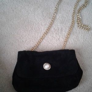 A dress bag by Marie  Ellyse